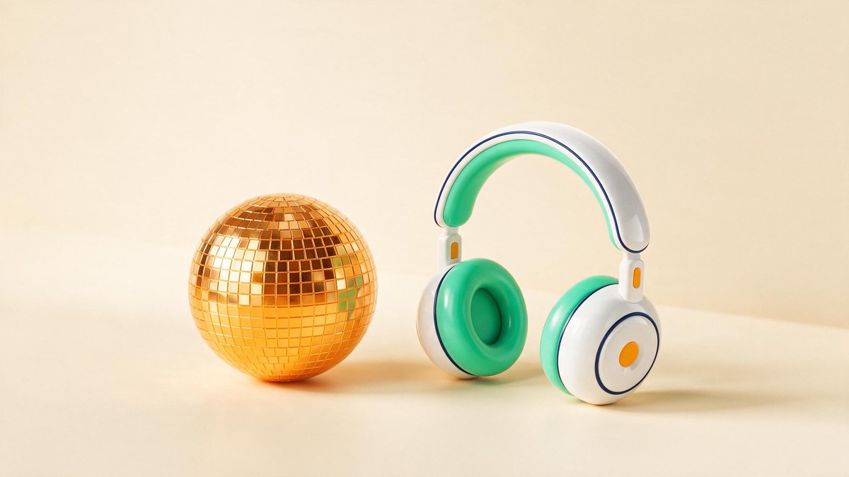 A soft-3D gold disco ball beside mint-and-white headphones on a warm cream surface
